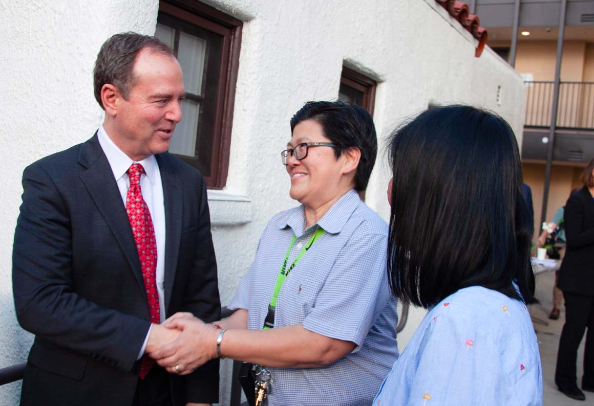 Adam schiff shaking hands